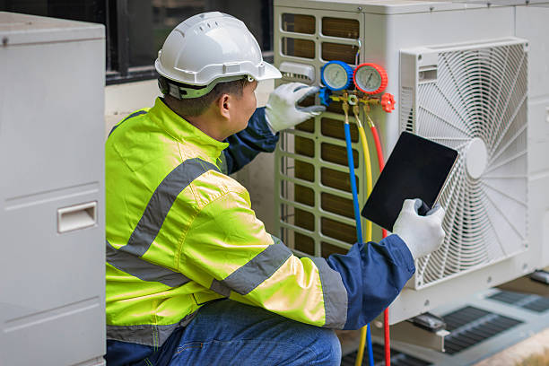 Professional Heat Pump Repair technician working in Athens, MI
